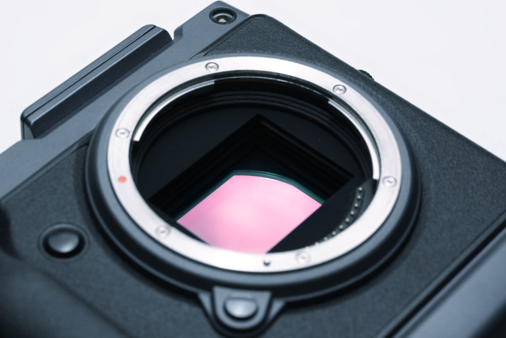 Closeup of the large sensor on a Fujifilm GFX 100 medium format camera